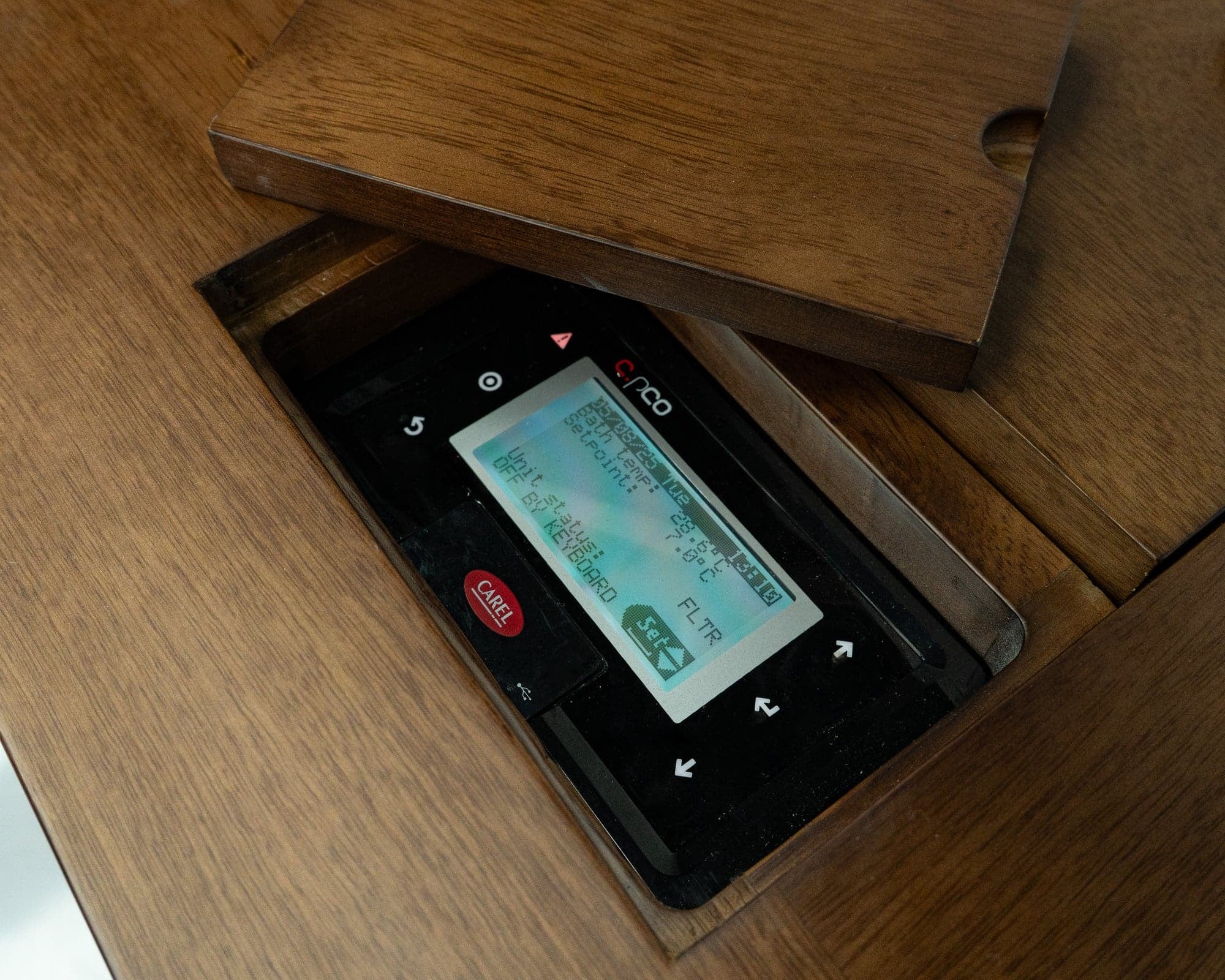 The built-in Carel controller set into the teak lid