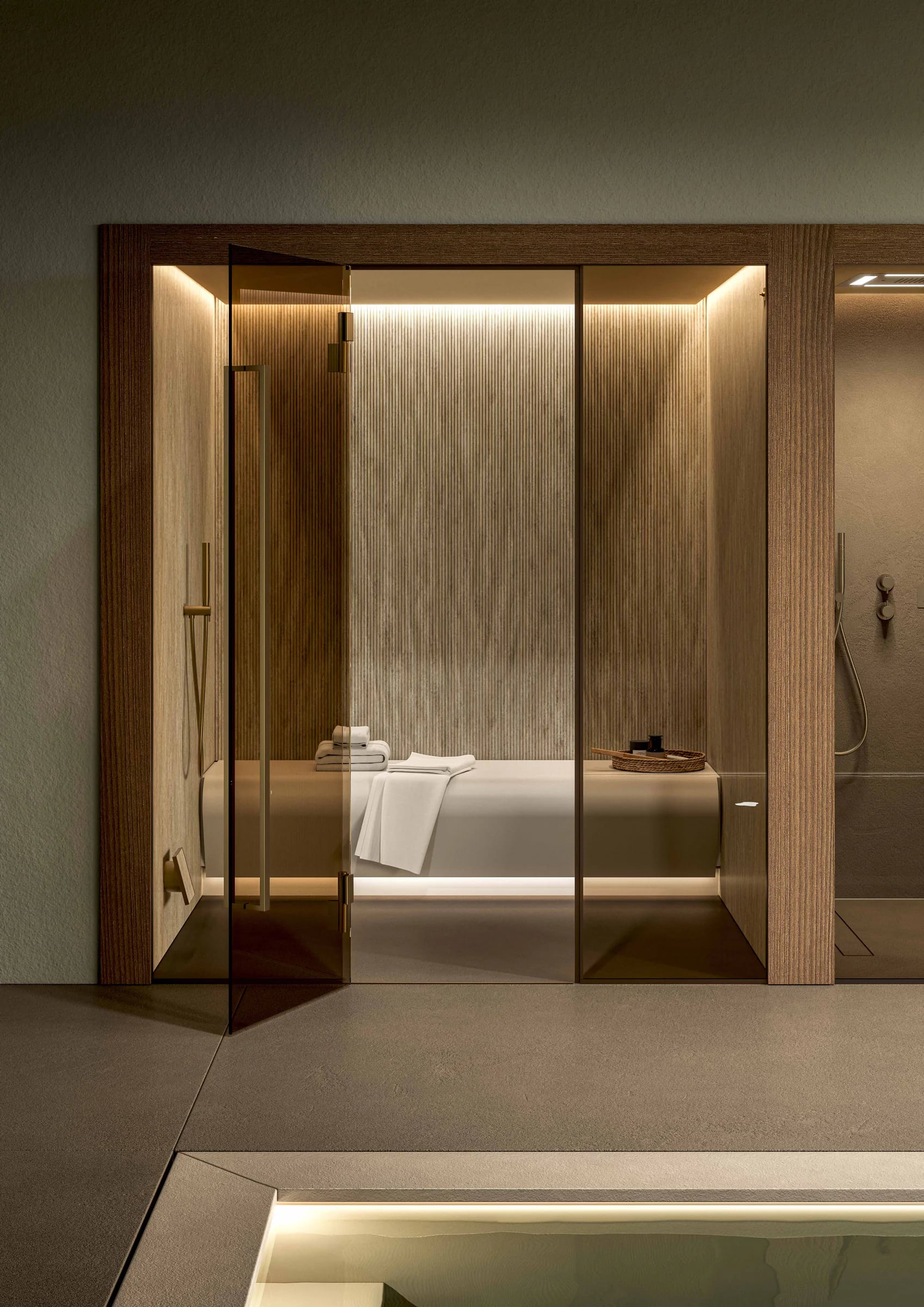 Glass-fronted Steam Room with stone benches and warm lighting